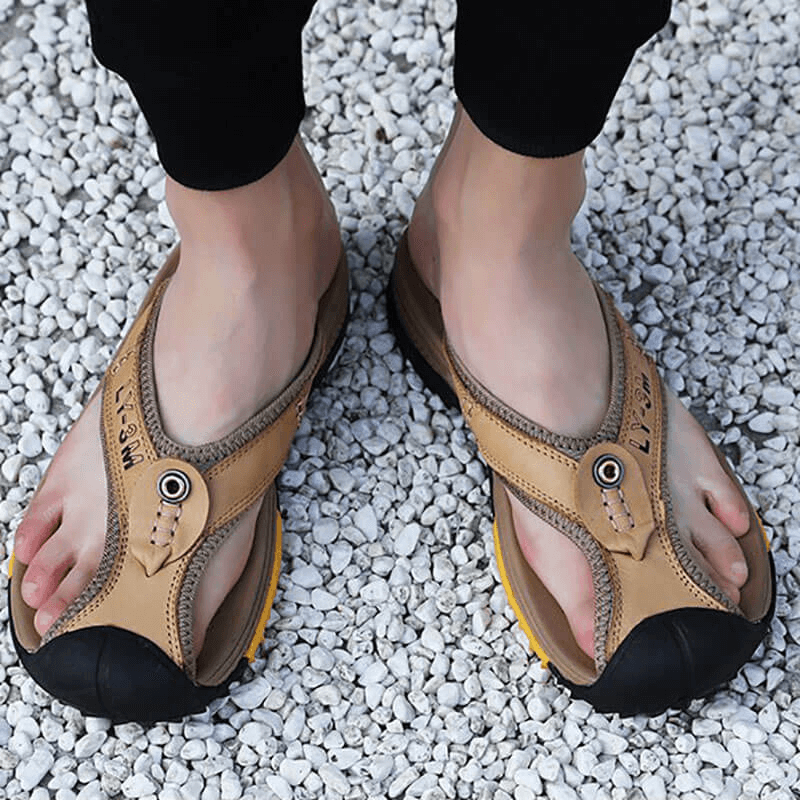 Casual Men's Genuine Leather Anti-slip Flip Flops SF1068 on gravel, stylish and durable outdoor footwear with low heel and padded insole